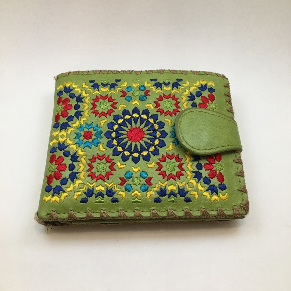 Lavishly embroidered green wallet